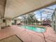 Refreshing screened pool and patio, perfect for relaxation at 10454 Ventura Dr, Spring Hill, FL 34608