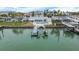 Aerial view of waterfront home with private dock and pool at 11185 5Th E St, Treasure Island, FL 33706