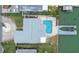 Bird's eye view showing home, pool, and private dock at 11185 5Th E St, Treasure Island, FL 33706