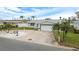 Single story home with attached garage and landscaped yard at 11185 5Th E St, Treasure Island, FL 33706