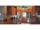 Bright kitchen with wood cabinets and granite countertops at 11185 5Th E St, Treasure Island, FL 33706