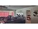 Living room with comfortable seating and view of bedroom at 11185 5Th E St, Treasure Island, FL 33706