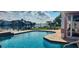 Inviting pool area overlooking the canal and other homes at 11185 5Th E St, Treasure Island, FL 33706