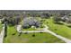 Aerial view of house, driveway and landscape at 11518 Hammock Oaks Ct, Lithia, FL 33547