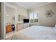 Comfortable bedroom with a queen-size bed and en-suite bathroom at 11518 Hammock Oaks Ct, Lithia, FL 33547