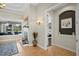 Elegant hallway with access to bedrooms and other rooms at 11518 Hammock Oaks Ct, Lithia, FL 33547