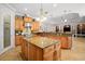 Spacious kitchen with large island and ample cabinet space at 11518 Hammock Oaks Ct, Lithia, FL 33547