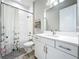 Clean bathroom featuring a shower/tub combo and white vanity at 13028 Homestead Ln, Parrish, FL 34219