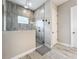 Walk-in shower with modern tile and glass enclosure at 13028 Homestead Ln, Parrish, FL 34219