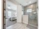 Spa-like bathroom with a walk-in shower and bedroom view at 13028 Homestead Ln, Parrish, FL 34219