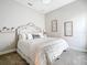 Spacious bedroom with a king-size bed and neutral color palette at 13028 Homestead Ln, Parrish, FL 34219