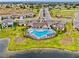 Community pool and clubhouse near lake at 13028 Homestead Ln, Parrish, FL 34219