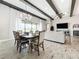 Elegant dining room with chandelier and hardwood floors at 13028 Homestead Ln, Parrish, FL 34219