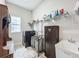 Functional laundry room with washer, dryer, and ample storage at 13028 Homestead Ln, Parrish, FL 34219
