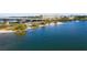 Aerial view of waterfront property with bridge and city skyline in background at 131 Bluff View Dr # 103, Belleair Bluffs, FL 33770