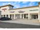 Modern commercial building with multiple storefronts and ample parking at 131 Bluff View Dr # 103, Belleair Bluffs, FL 33770
