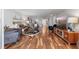 Long view of living room with hardwood floors and stylish decor at 131 Bluff View Dr # 103, Belleair Bluffs, FL 33770