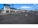 Ample parking lot in front of retail spaces at 131 Bluff View Dr # 103, Belleair Bluffs, FL 33770
