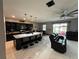 Modern kitchen with large island, stainless steel appliances, and ample cabinet space at 13828 Tonya Anne Dr, Riverview, FL 33579