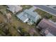 Aerial view highlighting the home's backyard and patio area at 1536 W Del Webb Blvd, Sun City Center, FL 33573