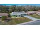 Aerial view of the house, showcasing its location and curb appeal at 1536 W Del Webb Blvd, Sun City Center, FL 33573