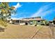 Spacious backyard with patio, screened enclosure and green grass at 1536 W Del Webb Blvd, Sun City Center, FL 33573