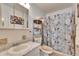 Clean bathroom with shower/tub combo and updated vanity at 1536 W Del Webb Blvd, Sun City Center, FL 33573