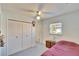 Bedroom with double bed, built-in closet, and window at 1536 W Del Webb Blvd, Sun City Center, FL 33573