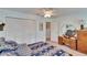 Spacious bedroom with ample closet space and vintage dresser at 1536 W Del Webb Blvd, Sun City Center, FL 33573