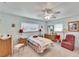 Cozy bedroom featuring a twin bed and vintage decor at 1536 W Del Webb Blvd, Sun City Center, FL 33573