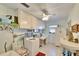 Laundry room with washer, dryer, and storage cabinets at 1536 W Del Webb Blvd, Sun City Center, FL 33573