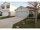 Charming single-story home with a two-car garage and well-maintained landscaping at 1668 Hazy Sea Dr, Plant City, FL 33565