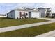 One-story house with a two-car garage and landscaping at 178 Brofield St, Brooksville, FL 34604