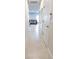 Bright hallway with tile flooring and access to living room at 178 Brofield St, Brooksville, FL 34604