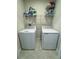 Laundry room with washer, dryer, and shelving for storage at 178 Brofield St, Brooksville, FL 34604