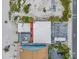 Overhead view of beachfront building and parking lot at 18838 Gulf Blvd # 202, Indian Shores, FL 33785