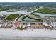 Aerial view of beachfront property and neighborhood at 18838 Gulf Blvd # 202, Indian Shores, FL 33785