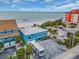 Aerial view of beachfront property with RV parking and ocean at 18838 Gulf Blvd # 202, Indian Shores, FL 33785