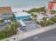Aerial view showing beachfront location and nearby buildings at 18838 Gulf Blvd # 202, Indian Shores, FL 33785