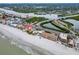 Aerial view of beachfront property and neighborhood at 18838 Gulf Blvd # 202, Indian Shores, FL 33785