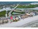 Aerial view of beachfront property and neighborhood at 18838 Gulf Blvd # 202, Indian Shores, FL 33785