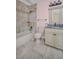 Updated bathroom with new vanity and tile at 18838 Gulf Blvd # 202, Indian Shores, FL 33785