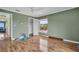 Simple bedroom with wood floors and a view at 18838 Gulf Blvd # 202, Indian Shores, FL 33785