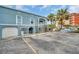 Beachfront building exterior with parking and garage at 18838 Gulf Blvd # 202, Indian Shores, FL 33785
