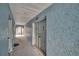 Building hallway with light blue walls at 18838 Gulf Blvd # 202, Indian Shores, FL 33785