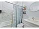 Clean bathroom with bathtub, shower, and white vanity at 189 Statler St, Port Charlotte, FL 33954
