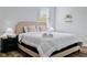King-size bedroom with plush bedding and neutral color scheme at 189 Statler St, Port Charlotte, FL 33954