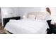 Spacious Primary bedroom with king-size bed and elegant decor at 189 Statler St, Port Charlotte, FL 33954