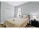 Bright bedroom with a double bed and wood flooring at 189 Statler St, Port Charlotte, FL 33954
