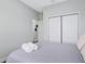 Well-lit bedroom with a double bed and access to a bathroom at 189 Statler St, Port Charlotte, FL 33954